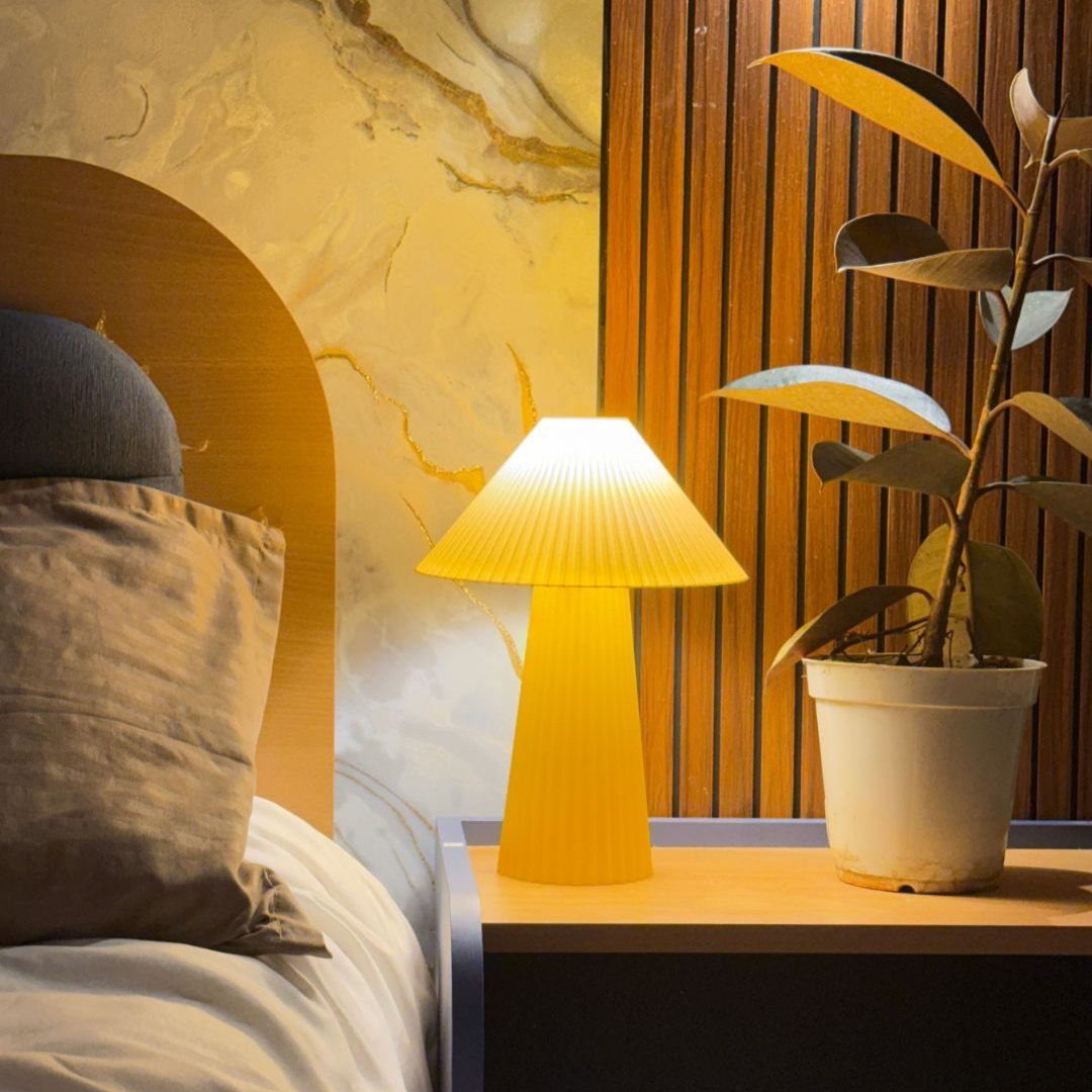 The Kyoto pleated table lamp in Sunset Yellow